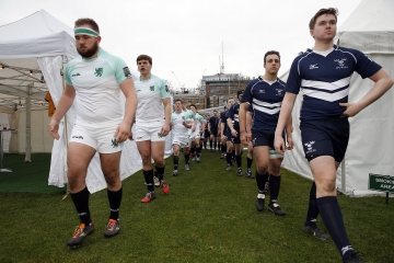 Teams enter the field during the RCMA Varsity Rugby League game between Cambridge University and Oxford University at the HAC Ground, Moorgate, London on Fri Mar 9, 2018